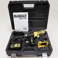 Skruvdragare DeWalt DCD734 14,4V,  batteriladdare, två batteri, manual, tillhörande väska. Skickas med postpaket.