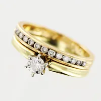 Ring, diamanter 1 x ca 0,20ct, 13 x ca 0,02ct, stl 16½, bredd 4-5mm, två sammansatta ringar, gravyr, 14K Vikt: 4,5 g