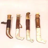 Fyra sameknivar, längd ca 22-29cm, dekorerad slida i ben samt läder, skaft av ben, varav tre signerade. 