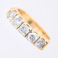 Ring med diamanter 5 x ca 0,16ct, kvalité ca Crystal (J)/P, stl 16, bredd 4mm, Schalins, 18K  Vikt: 5 g