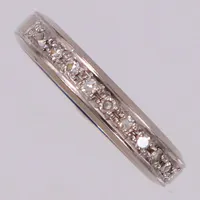 Alliansring med 8/8-slipade diamanter ca 0,12ctv, bredd 3,7mm,stl 16¼, vitguld importstämpel, 18K Vikt: 4,9 g
