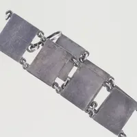 Armband WIWEN NILSSON Lund 1963, längd 19 cm, bredd 2 cm, silver lite repor 40,6 gr Vikt: 40,6 g