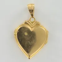 Hänge, medaljong i form av hjärta, ca 31x20mm inklusive ögla, repig, 18K Vikt: 5 g
