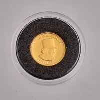 Samlarmynt i 24K guld, H.C. Andersen 1805-1875, Ø13,9 mm, plastetui, vikt 1,23g.