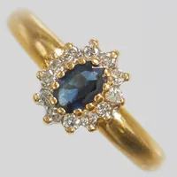 Ring med diamanter 12 x ca 0,02ct och safir, Ø18½, 2,3-10mm, 18K Vikt: 4,3 g