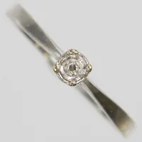 Ring med diamant 1 x ca. 0,01ct, Ø17½, bredd: 1,3-3,5mm, importstämpel, vitguld, 18K Vikt: 1,6 g