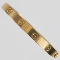 Armband Cartier Love Bracelet, stl: 17, innermått: 57x47mm, bredd: 6mm, srn: OZ0411, bruksslitage, tillhörande skruvmejsel, rengöringskit och box, 18K, 32,4g Vikt: 32,4 g Skickas med postpaket.