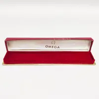 Klocketui, Omega, 21,5x4cm, slitage