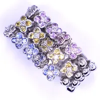 Ring med färgade stenar och diamanter totalt 0,10ct, stl 17¼, bredd 14mm, flexibel, vitguld, 18K Vikt: 10,7 g