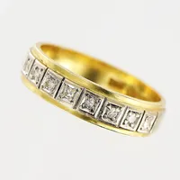 Ring, diamanter 7 x ca 0,01ct, stl 17¼, bredd 5mm, vit/gulguld, 18K Vikt: 4,5 g