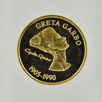 Minnesmynt Greta Garbo 100 år, år 2005, Ø22 mm, plastkassett medföljer, 21,6K.  Vikt: 8,7 g