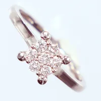 Ring, vitguld, diamanter, ca:7x0,02-0,03ct,  Ø17¾, 18k  Vikt: 3,1 g