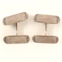 Ett par manschettknappar, längd ca 18,5mm, bredd 12mm, Carlson K & E, år 1947, silver  Vikt: 9,5 g