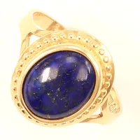 Ring sten lapis lazuli, stl 15½, bredd13mm, limrester vid skena, Sävsjö Guldsmeds AB, år 1996, 18K  Vikt: 1,8 g