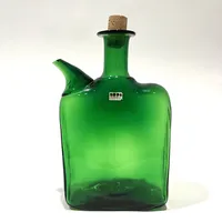 Flaska, Bert Vallien, grön, längd 24cm, bredd 13, djup 5cm, etikettmärkt Boda Åfors,  Skickas med postpaket.