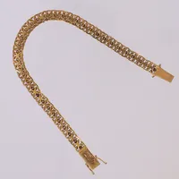 Armband, x-länk, längd 18,5cm, bredd 6,1mm, buckla, 18K Vikt: 12,6 g