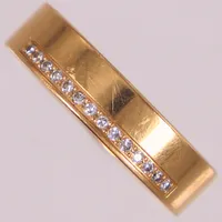 Ring med diamanter 14xca0,01ct, stl 21¼, bredd ca 6mm, Schalins. 18K  Vikt: 8 g