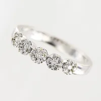 Ring, 35st briljantslipade diamanter 0,40ctv, stl 19¾, höjd 1,5-4mm, vitguld, GHA, 18K Vikt: 5,1 g