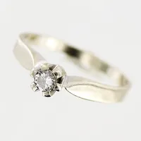 Ring, diamant 0,15ct enligt gravyr, stl 18½, bredd 2-4mm, vitguld, 18K.  Vikt: 3,5 g