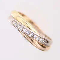 Ring med briljantslipade diamanter tot 0,15ctv enligt gravyr, trefärgat, stl: 20, bredd 5,9mm, 18K.   Vikt: 7,4 g