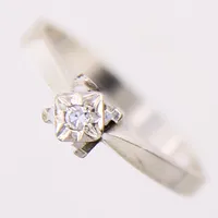 Ring med 8/8-slipad diamant 1 x 0,02ct, stl: 16, vitguld 18K.  Vikt: 2 g