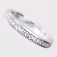 Ring med briljantslipade diamanter 16 x 0,015ct, stl: 16½, bredd 2,9mm, GHA, gravyr, vitguld 18K.  Vikt: 4,5 g