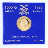 Minnesmynt "KUNG CARL XVI GUSTAF 25 ÅR"  från 1998 i plastetui. 21,6K.  Vikt: 5,8 g