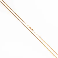 Veneziakedja i 18K guld. Den är 50 cm lång, 1,2 mm bred och väger 5,0g. Springring. Från Unoaerre. Kattfot & 750.