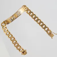 Armband, pansar, integrerad namnbricka med diamanter 18 x ca. 0,01ct, längd: 21cm, bredd: 10-10,5mm, 18K Vikt: 71,5 g