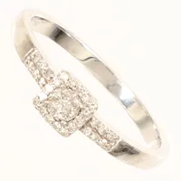 Ring med diamanter ca 35x 0,001-0,01ct, vitguld, stl 17¼, bredd ca 4,8mm, Guldfynd, 18K Vikt: 2,4 g
