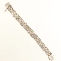 Armband X-länk, längd ca 18,5cm, bredd ca 13,7mm, N S E Guldvaru Aktiebolag Köping 1980, något buckligt vid lås, 830/1000 silver Vikt: 14,9 g