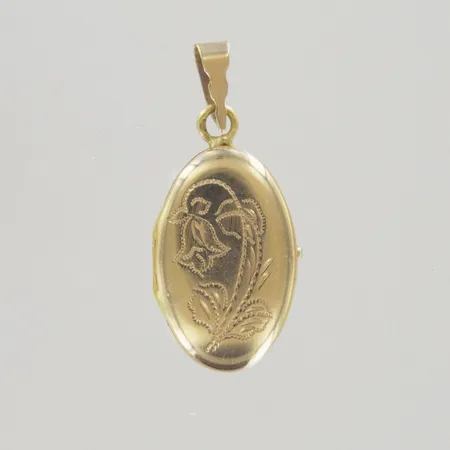 Hänge Medaljong, längd 3,3 cm, bredd 15mm, graverad, 18K, guldvikt exklusive plast. Vikt: 4,1 g