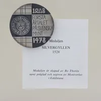 Medalj skapad av Bo Thorén, diam 45 mm, Max upplaga 2000, silver 925/1000 Vikt: 65 g