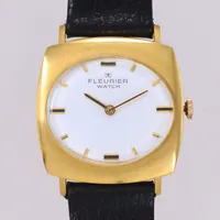 Armbandsur, Fleurier Watch, 18K, 31mm, 542002, manuell, gravyr år 1976, repor på plastglas, svart originalband. Bruttovikt 31,0g