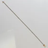 Armband, Rivière med diamanter 67 x ca. 003ct, totalt 2,0ctv W(H)/Si, 18cm, bredd: 2,5mm, etui och kvitto från Guldfynd, 18K Vikt: 11,9 g