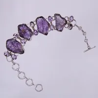 Armband med lila stenar, längd: ca 22,5cm, justerbart, bredd: ca 10-27mm, 925/1000, silver Vikt: 42 g