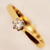 Ring, diamant 0,10ct enligt gravyr, Ø15¾, bredd:4mm, 18K 2,2g.