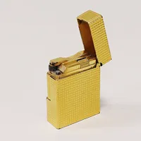 Tändare S.T Dupont, Paris, nr 1C80Y05, 4,5x3,5cm, gulddoublé, bok box ytterkartong, ej funktionstestad.
