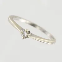 Ring, diamant 0,08ct enligt gravyr, stl 17, bredd 1-3m, vitguld, 14K.  Vikt: 1,5 g