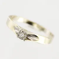 Ring, diamant ca 0,02ct, 8/8-slipad, stl 17½, bredd 2-3mm, vitguld, 18K.  Vikt: 1,6 g