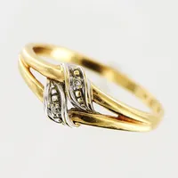Ring, diamanter 2 x ca 0,005ct, stl 18, bredd 1,5-7mm, 18K.  Vikt: 1,9 g