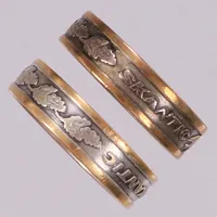 2 Ringar med text "Skantic", stl 21¾ och 21½, repor, slitage, silver 830/1000 Vikt: 11,9 g