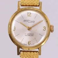 Damur, Nicolet Watch, 18K, manuell, 22mm, plexiglas med repor, boettnr: 9533, länk i guldfärgat stål, ställbar längd, brv: 23,6g
