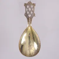 Sked, längd 12cm, samiskt motiv med lösa ringar, Eric Lindbäck Nederkalix, år 1948, förgyllt blad, repor, 830/1000 silver  Vikt: 35,5 g