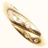 Ring diamanter 0,06ct enligt gravyr, stl 17, bredd 5,7mm, tvåfärgad, 18K  Vikt: 3,1 g