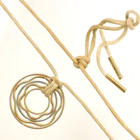 Collier Omega, ca 70cm tygband med guldavslut 18K nr: 46164, hänge Omega, Ø 34mm, N 57013, 18K, missfärgat tygband, bruttovikt: 13,9g 