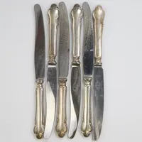 6 Matknivar, modell:Disa, längd:211mm, fyllda skaft, blad i rostfritt stål, silver 830/1000. Vikt: 295 g