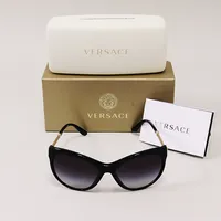 Solglasögon Versace, mod. 4292, GB1/8G, 57¤17 140 3N, båge i svart/gulmetall, folder, putsduk, fodral, ytterkartong.