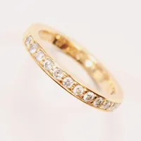 Ring, 14x diamanter totalt 0,28ctv enligt gravyr, Ø15, bredd:3mm, gravyr, 18K 3,1g.