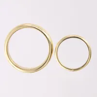Två ringar, stl 15¼+ 20¼, bredd ca 2,5-4mm, 18K Vikt: 11 g